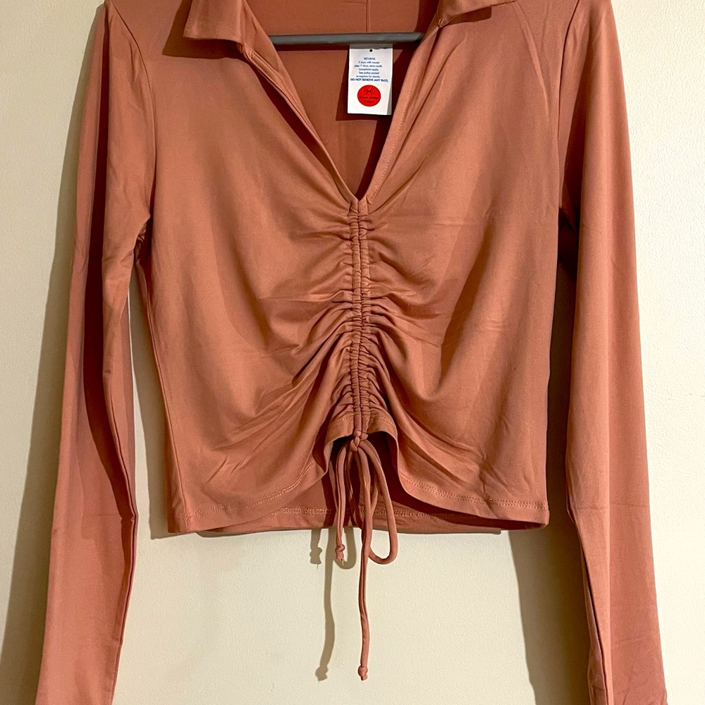 Brand new rose gold blouse